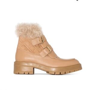 Aquazzura
Ryan faux-fur buckle-strap boots